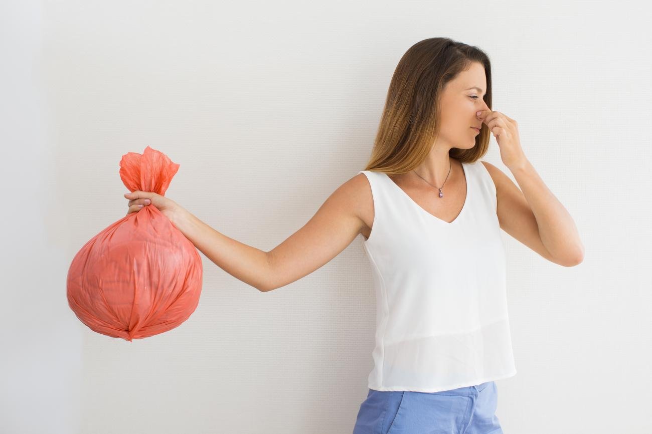 Scented garbage bag masking odors