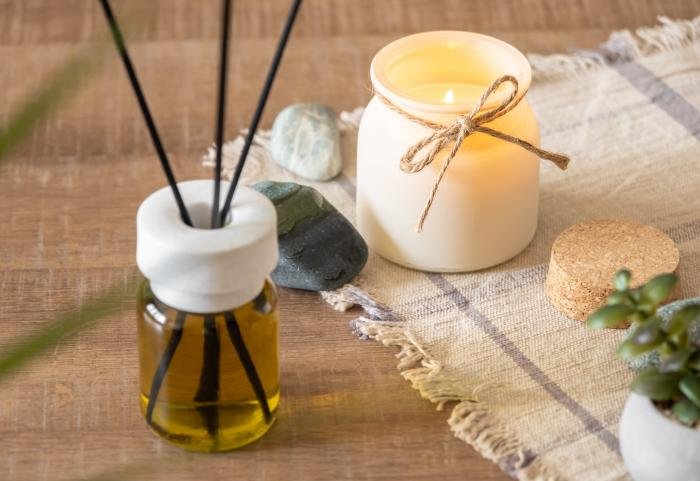 Fragrance layering with candle diffuser combination