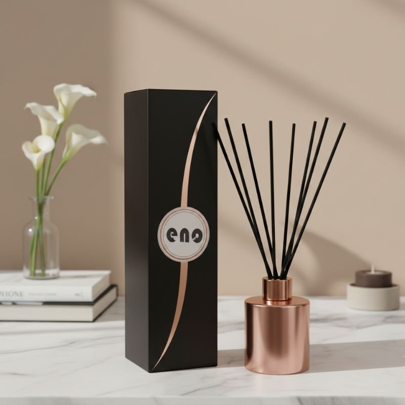 Luxury rose gold reed diffuser on marble table